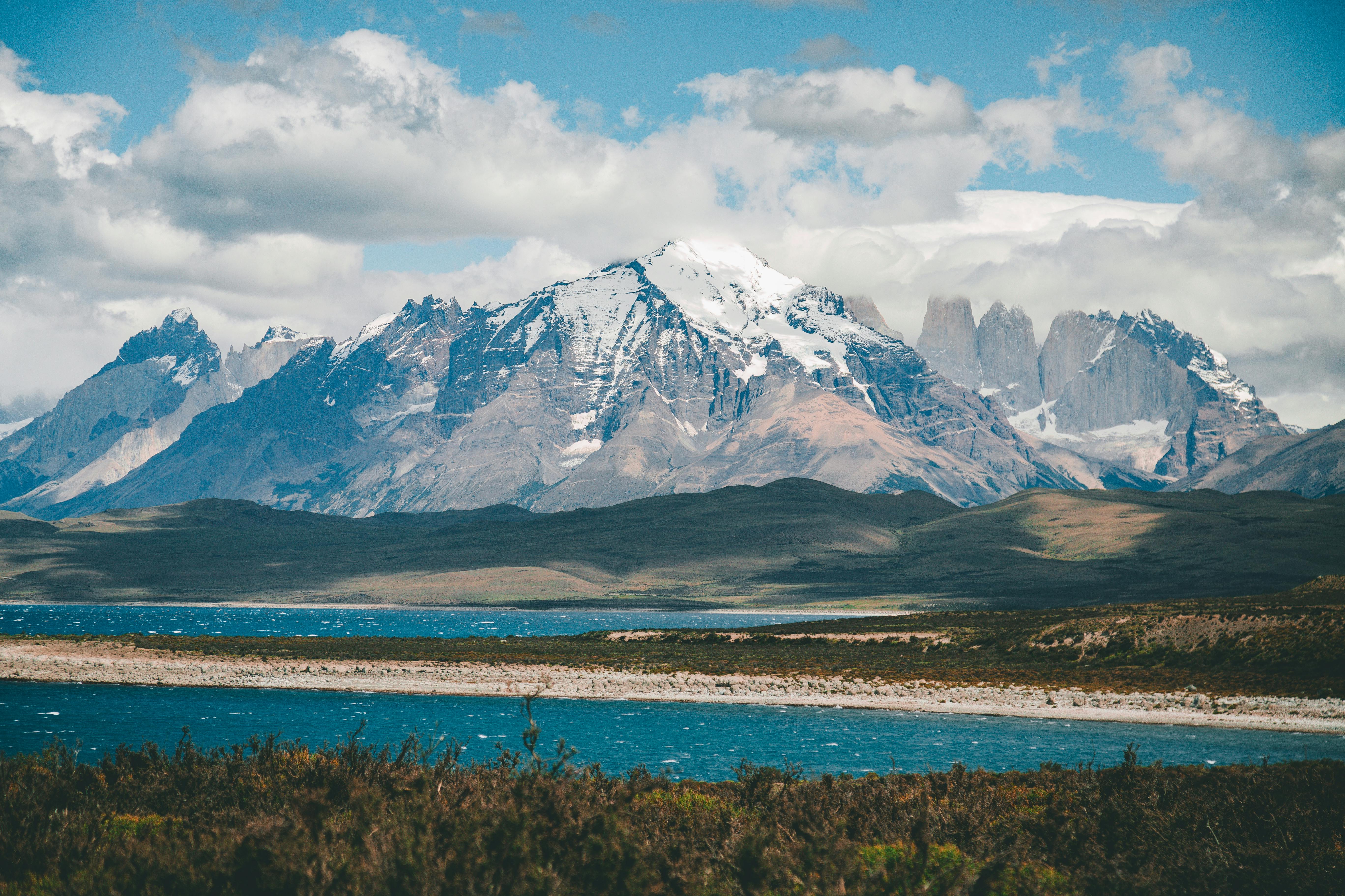 A hiker overlooking the dramatic peaks of Patagonia